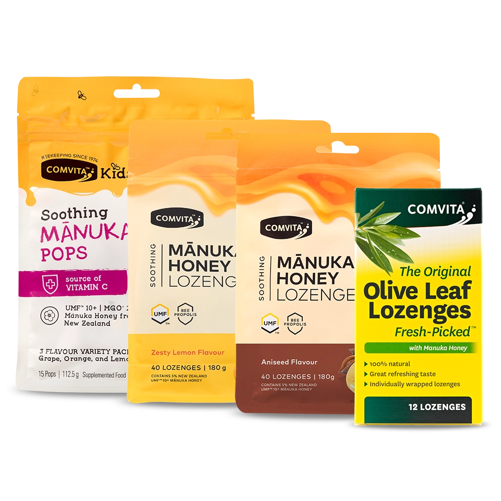 Collection of Comvita Manuka honey lozenge packages on a white background