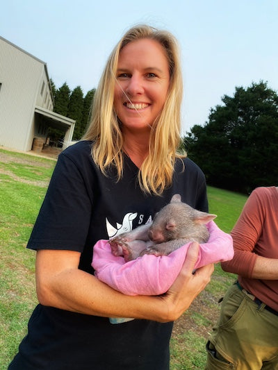 jamie holding a wounded wombat